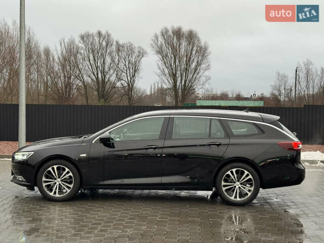 Чорний Опель Інсігнія, об'ємом двигуна 2 л та пробігом 194 тис. км за 15600 $, фото 3 на Automoto.ua