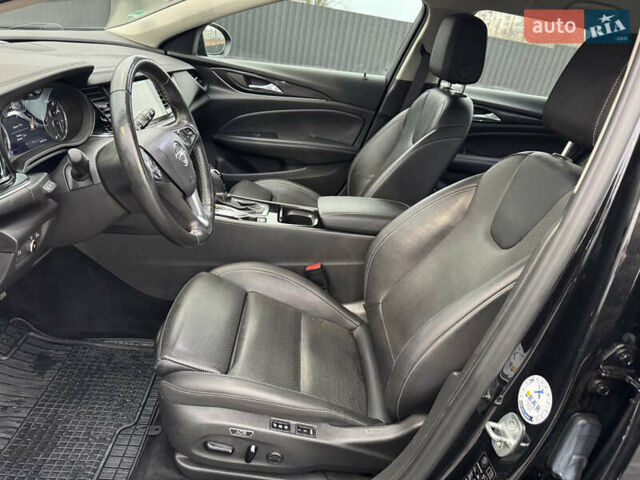 Чорний Опель Інсігнія, об'ємом двигуна 2 л та пробігом 194 тис. км за 15600 $, фото 28 на Automoto.ua