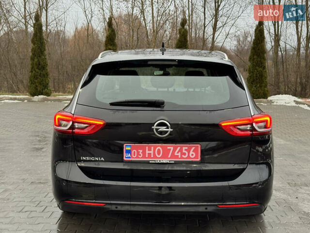 Чорний Опель Інсігнія, об'ємом двигуна 2 л та пробігом 194 тис. км за 15600 $, фото 5 на Automoto.ua