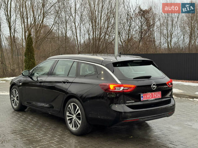 Чорний Опель Інсігнія, об'ємом двигуна 2 л та пробігом 194 тис. км за 15600 $, фото 4 на Automoto.ua