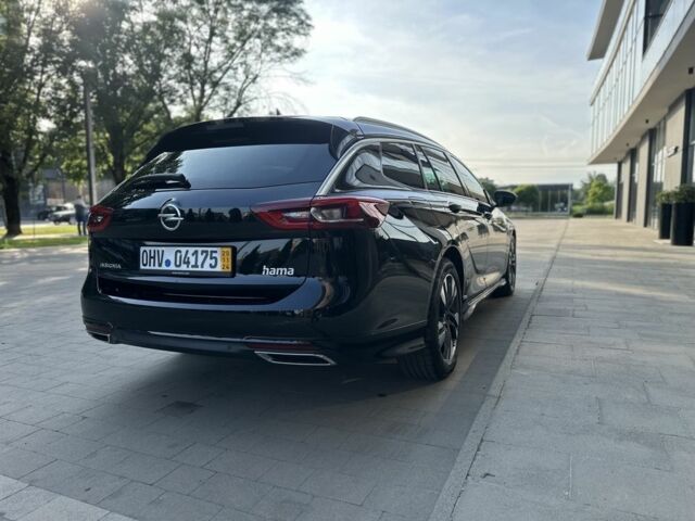 Черный Опель Инсигния, объемом двигателя 2 л и пробегом 196 тыс. км за 17000 $, фото 4 на Automoto.ua