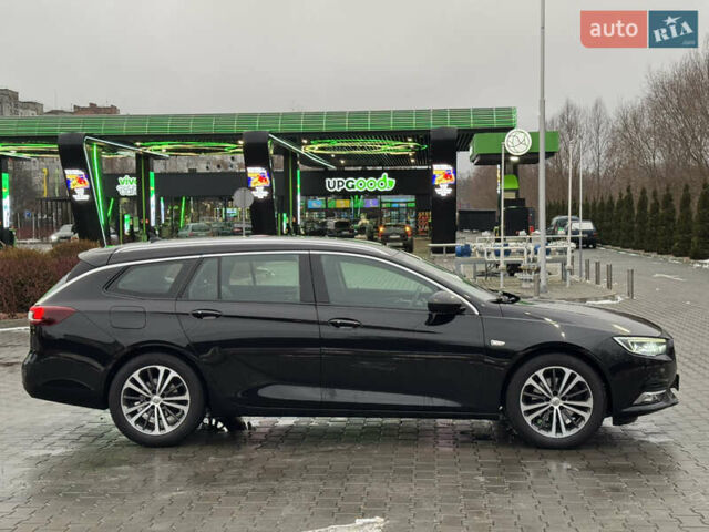 Чорний Опель Інсігнія, об'ємом двигуна 2 л та пробігом 194 тис. км за 15600 $, фото 7 на Automoto.ua