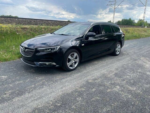 Чорний Опель Інсігнія, об'ємом двигуна 2 л та пробігом 180 тис. км за 15500 $, фото 1 на Automoto.ua