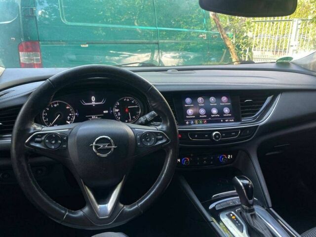 Чорний Опель Інсігнія, об'ємом двигуна 2 л та пробігом 180 тис. км за 15500 $, фото 4 на Automoto.ua