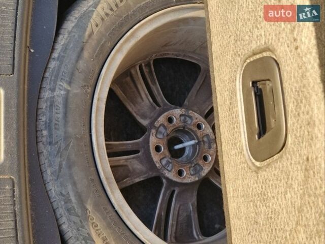 Чорний Опель Інсігнія, об'ємом двигуна 1.6 л та пробігом 154 тис. км за 16300 $, фото 4 на Automoto.ua