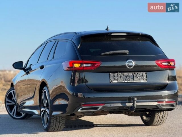 Черный Опель Инсигния, объемом двигателя 2 л и пробегом 178 тыс. км за 19999 $, фото 6 на Automoto.ua