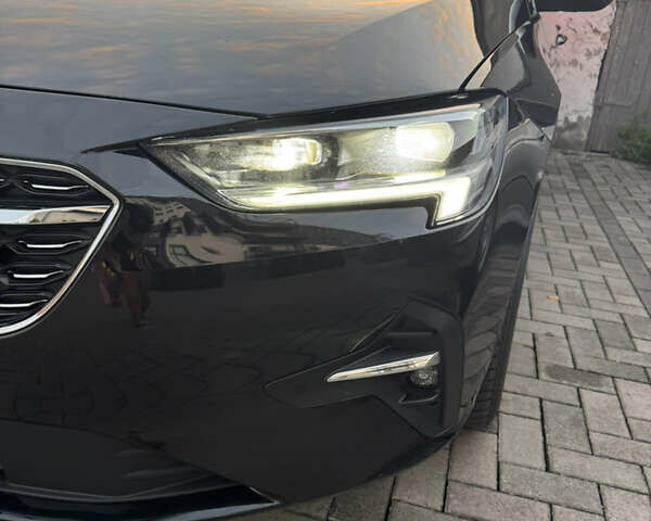 Чорний Опель Інсігнія, об'ємом двигуна 1.96 л та пробігом 213 тис. км за 18422 $, фото 18 на Automoto.ua