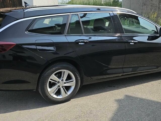 Черный Опель Инсигния, объемом двигателя 2 л и пробегом 25 тыс. км за 18400 $, фото 4 на Automoto.ua