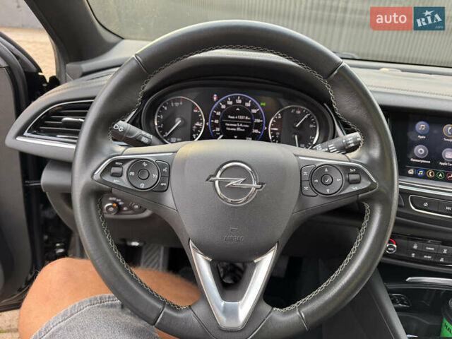 Чорний Опель Інсігнія, об'ємом двигуна 1.96 л та пробігом 213 тис. км за 18422 $, фото 22 на Automoto.ua
