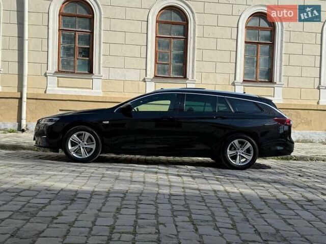 Черный Опель Инсигния, объемом двигателя 2 л и пробегом 59 тыс. км за 24500 $, фото 5 на Automoto.ua