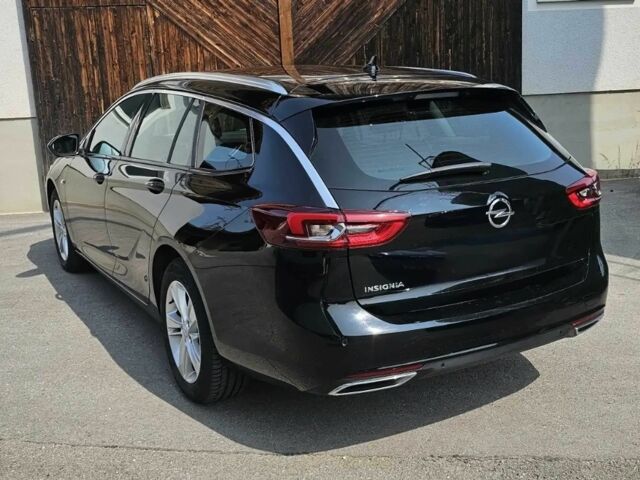 Черный Опель Инсигния, объемом двигателя 2 л и пробегом 25 тыс. км за 18400 $, фото 3 на Automoto.ua