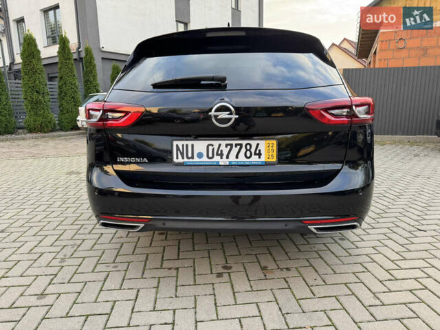 Чорний Опель Інсігнія, об'ємом двигуна 1.96 л та пробігом 213 тис. км за 18422 $, фото 6 на Automoto.ua