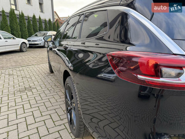 Чорний Опель Інсігнія, об'ємом двигуна 1.96 л та пробігом 213 тис. км за 18422 $, фото 8 на Automoto.ua