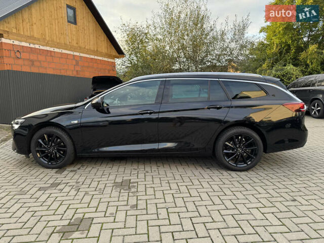 Чорний Опель Інсігнія, об'ємом двигуна 1.96 л та пробігом 213 тис. км за 18422 $, фото 9 на Automoto.ua