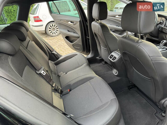 Чорний Опель Інсігнія, об'ємом двигуна 1.96 л та пробігом 213 тис. км за 18422 $, фото 41 на Automoto.ua