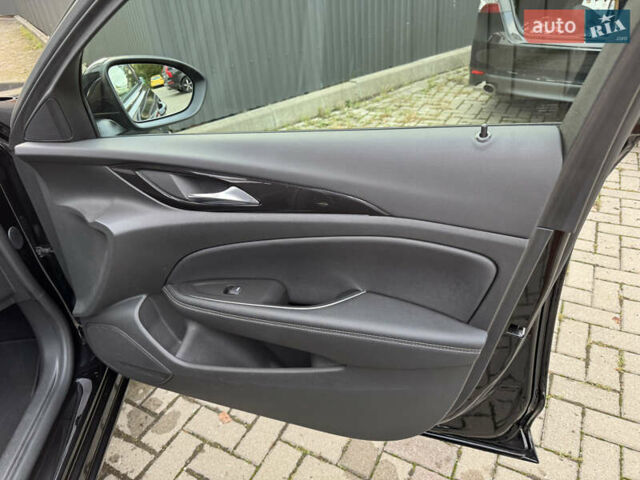 Чорний Опель Інсігнія, об'ємом двигуна 1.96 л та пробігом 213 тис. км за 18422 $, фото 42 на Automoto.ua