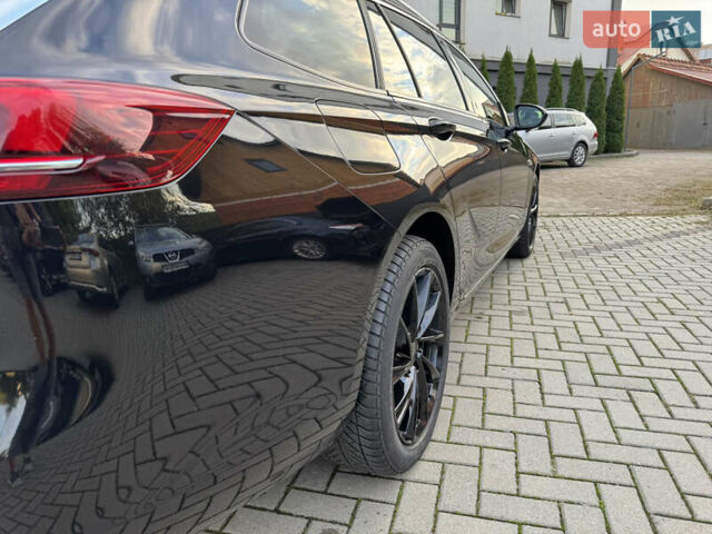 Чорний Опель Інсігнія, об'ємом двигуна 1.96 л та пробігом 213 тис. км за 18422 $, фото 5 на Automoto.ua