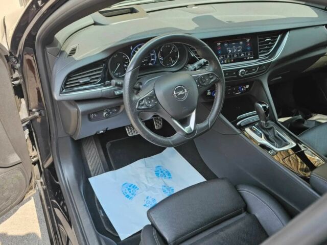 Черный Опель Инсигния, объемом двигателя 2 л и пробегом 25 тыс. км за 18400 $, фото 7 на Automoto.ua