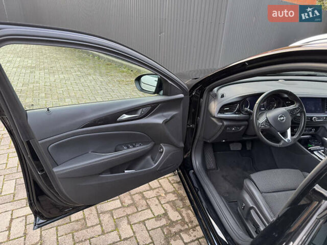 Чорний Опель Інсігнія, об'ємом двигуна 1.96 л та пробігом 213 тис. км за 18422 $, фото 34 на Automoto.ua