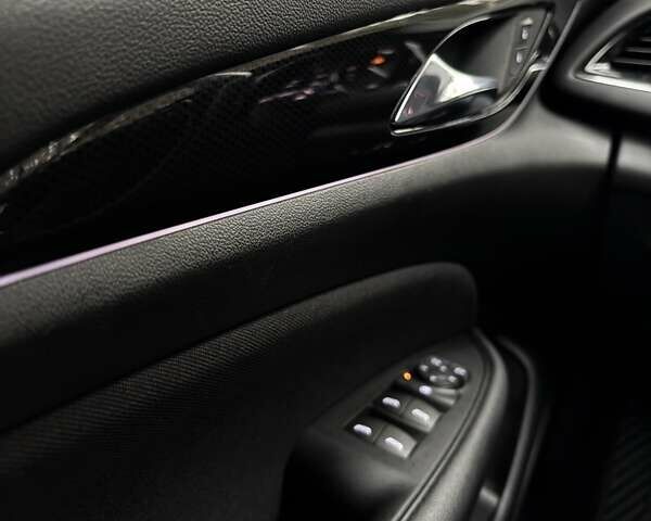 Черный Опель Инсигния, объемом двигателя 1.96 л и пробегом 168 тыс. км за 18800 $, фото 13 на Automoto.ua