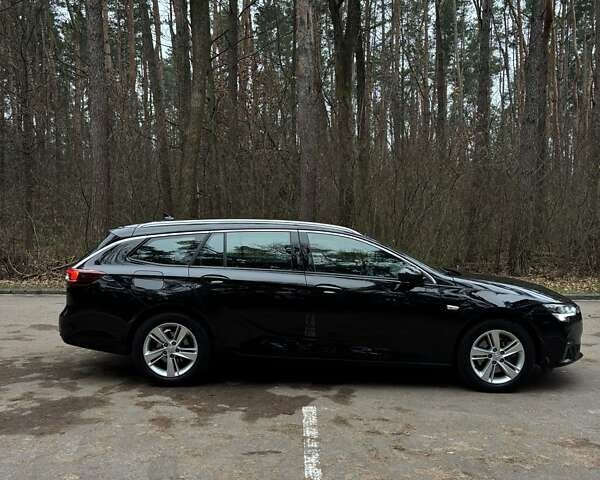 Черный Опель Инсигния, объемом двигателя 1.96 л и пробегом 168 тыс. км за 18800 $, фото 7 на Automoto.ua