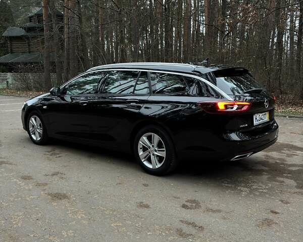 Черный Опель Инсигния, объемом двигателя 1.96 л и пробегом 168 тыс. км за 18800 $, фото 4 на Automoto.ua