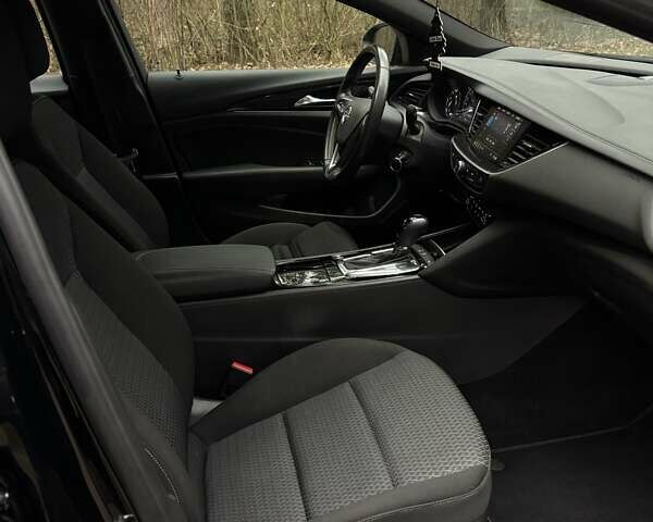 Черный Опель Инсигния, объемом двигателя 1.96 л и пробегом 168 тыс. км за 18800 $, фото 16 на Automoto.ua