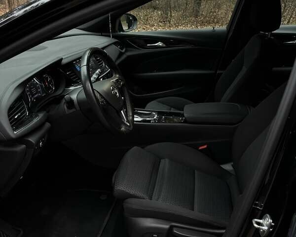 Черный Опель Инсигния, объемом двигателя 1.96 л и пробегом 168 тыс. км за 18800 $, фото 15 на Automoto.ua