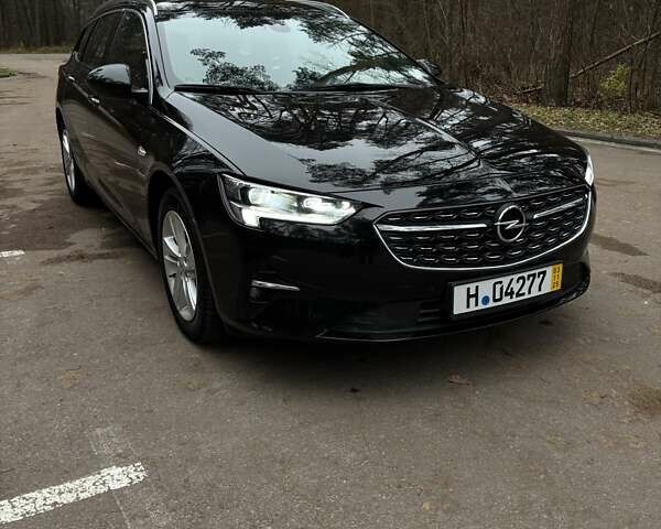 Черный Опель Инсигния, объемом двигателя 1.96 л и пробегом 168 тыс. км за 18800 $, фото 8 на Automoto.ua