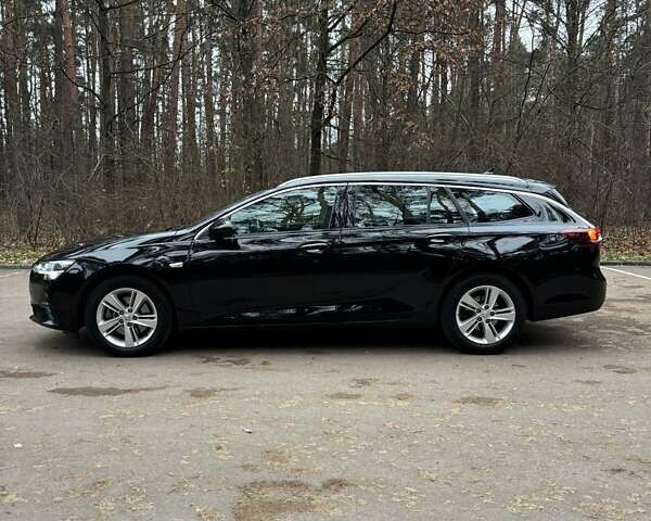 Черный Опель Инсигния, объемом двигателя 1.96 л и пробегом 168 тыс. км за 18800 $, фото 3 на Automoto.ua