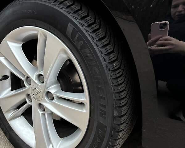 Черный Опель Инсигния, объемом двигателя 1.96 л и пробегом 168 тыс. км за 18800 $, фото 20 на Automoto.ua