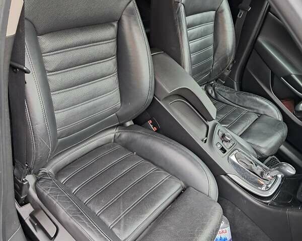 Черный Опель Инсигния, объемом двигателя 1.96 л и пробегом 290 тыс. км за 7999 $, фото 22 на Automoto.ua