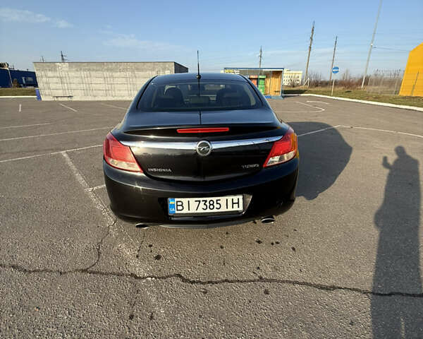 Черный Опель Инсигния, объемом двигателя 2 л и пробегом 193 тыс. км за 6100 $, фото 6 на Automoto.ua