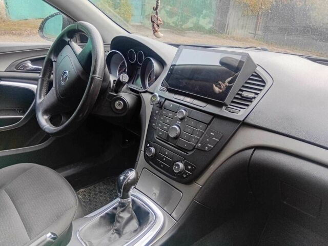 Чорний Опель Інсігнія, об'ємом двигуна 1.8 л та пробігом 220 тис. км за 6500 $, фото 5 на Automoto.ua