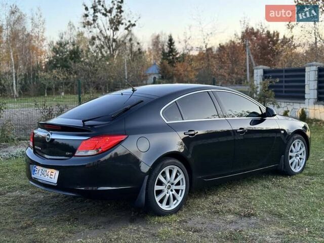 Черный Опель Инсигния, объемом двигателя 1.96 л и пробегом 242 тыс. км за 6999 $, фото 6 на Automoto.ua