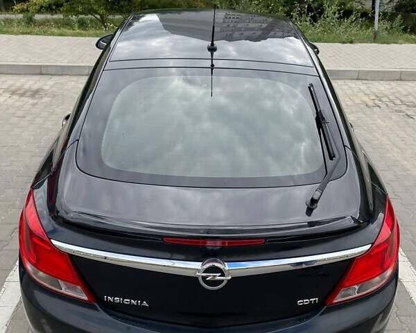 Чорний Опель Інсігнія, об'ємом двигуна 1.96 л та пробігом 264 тис. км за 5800 $, фото 5 на Automoto.ua