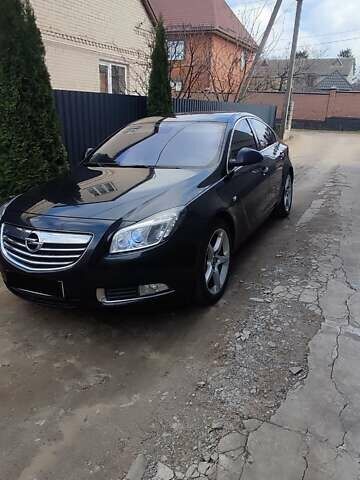 Чорний Опель Інсігнія, об'ємом двигуна 1.96 л та пробігом 175 тис. км за 9950 $, фото 4 на Automoto.ua