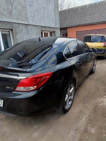 Чорний Опель Інсігнія, об'ємом двигуна 1.96 л та пробігом 175 тис. км за 9950 $, фото 11 на Automoto.ua