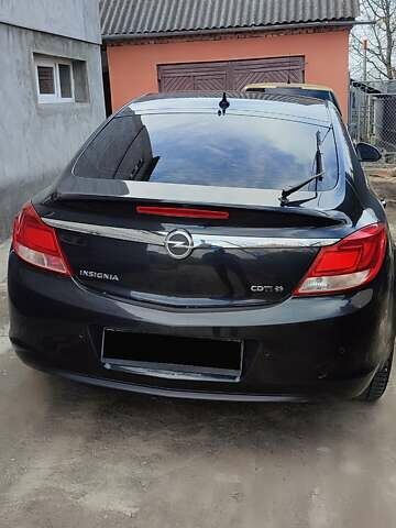 Чорний Опель Інсігнія, об'ємом двигуна 1.96 л та пробігом 175 тис. км за 9950 $, фото 12 на Automoto.ua