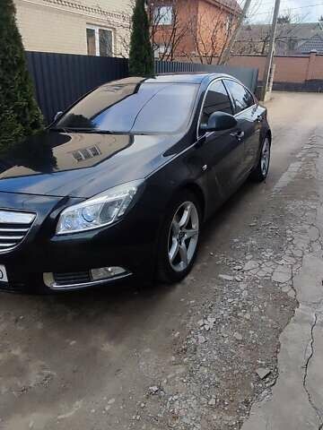 Чорний Опель Інсігнія, об'ємом двигуна 1.96 л та пробігом 175 тис. км за 9950 $, фото 3 на Automoto.ua