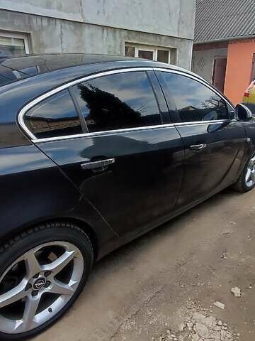 Чорний Опель Інсігнія, об'ємом двигуна 1.96 л та пробігом 175 тис. км за 9950 $, фото 9 на Automoto.ua