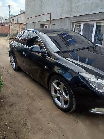 Чорний Опель Інсігнія, об'ємом двигуна 1.96 л та пробігом 175 тис. км за 9950 $, фото 1 на Automoto.ua