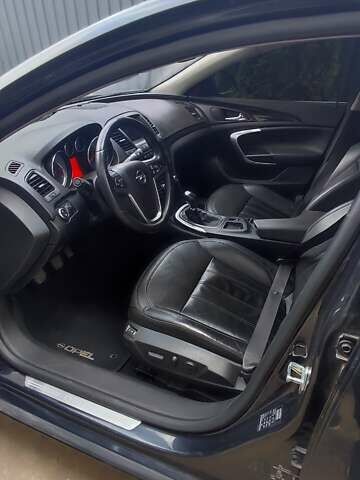 Чорний Опель Інсігнія, об'ємом двигуна 1.96 л та пробігом 175 тис. км за 9950 $, фото 7 на Automoto.ua