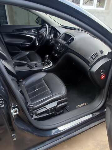 Чорний Опель Інсігнія, об'ємом двигуна 1.96 л та пробігом 175 тис. км за 9950 $, фото 8 на Automoto.ua