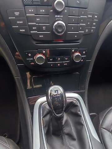 Чорний Опель Інсігнія, об'ємом двигуна 1.96 л та пробігом 175 тис. км за 9950 $, фото 6 на Automoto.ua