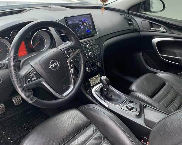 Чорний Опель Інсігнія, об'ємом двигуна 1.96 л та пробігом 300 тис. км за 10177 $, фото 1 на Automoto.ua