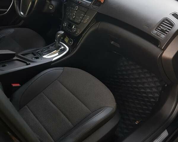 Черный Опель Инсигния, объемом двигателя 1.96 л и пробегом 347 тыс. км за 8300 $, фото 16 на Automoto.ua