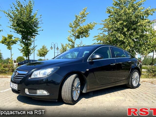 Чорний Опель Інсігнія, об'ємом двигуна 2 л та пробігом 312 тис. км за 7800 $, фото 4 на Automoto.ua