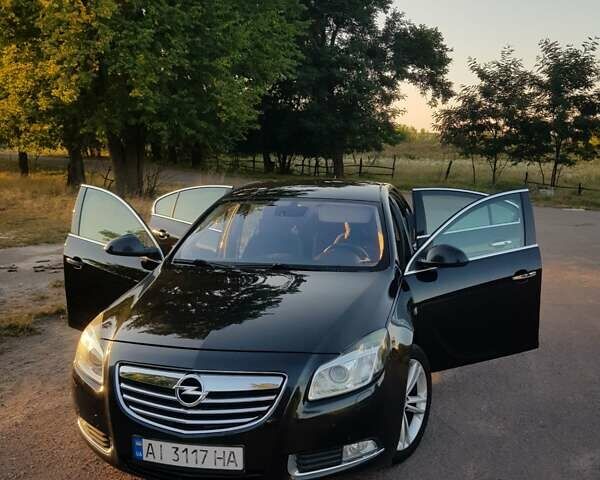 Черный Опель Инсигния, объемом двигателя 1.96 л и пробегом 347 тыс. км за 8300 $, фото 11 на Automoto.ua