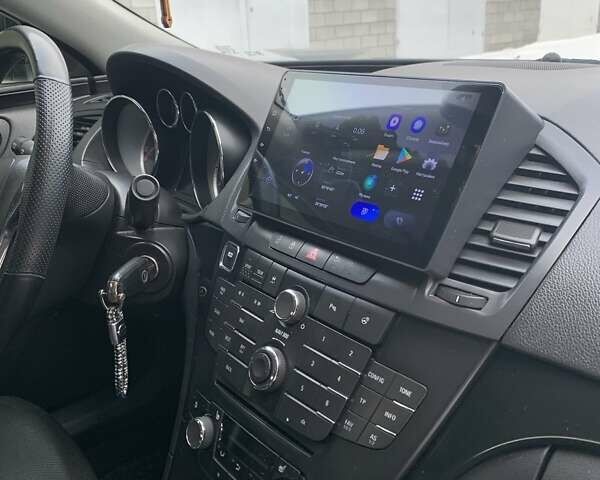 Чорний Опель Інсігнія, об'ємом двигуна 1.96 л та пробігом 300 тис. км за 10177 $, фото 8 на Automoto.ua